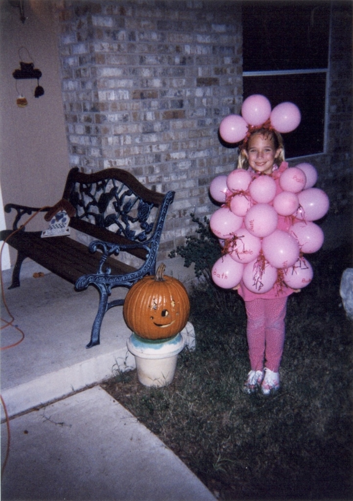Girl in pink balloon costume